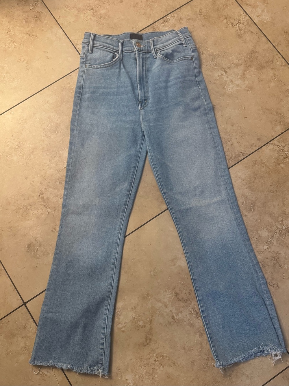 MOTHER Light Blue Flare Jeans with Raw Hem
